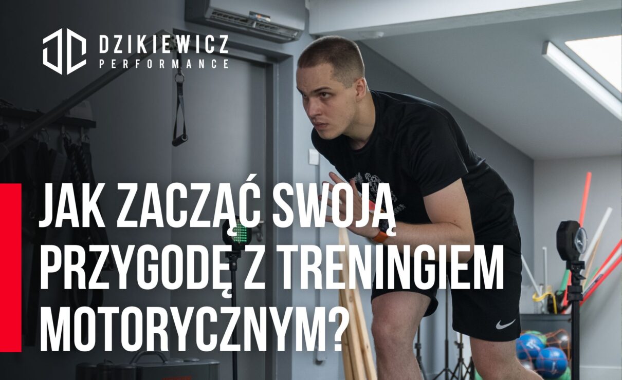 Trener w studio Dzikiewicz Performance przygotowujący się do ćwiczeń motorycznych.